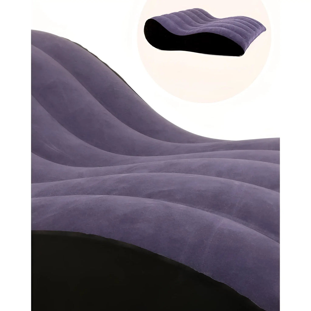 Purple inflatable mini sex positioning mattress with black underside and ribbed texture for comfort and support