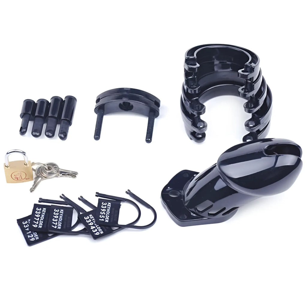 Black plastic Daytona male chastity kit featuring a chastity cage with matching black lock and keys