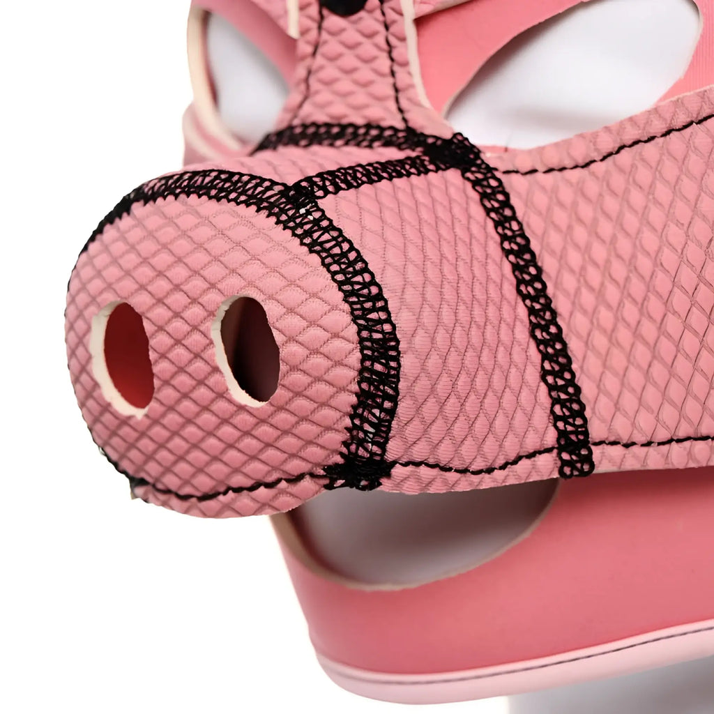Daytona neoprene pig mask pink with pink pig-shaped sandal featuring textured mesh upper and black lace trim around snout