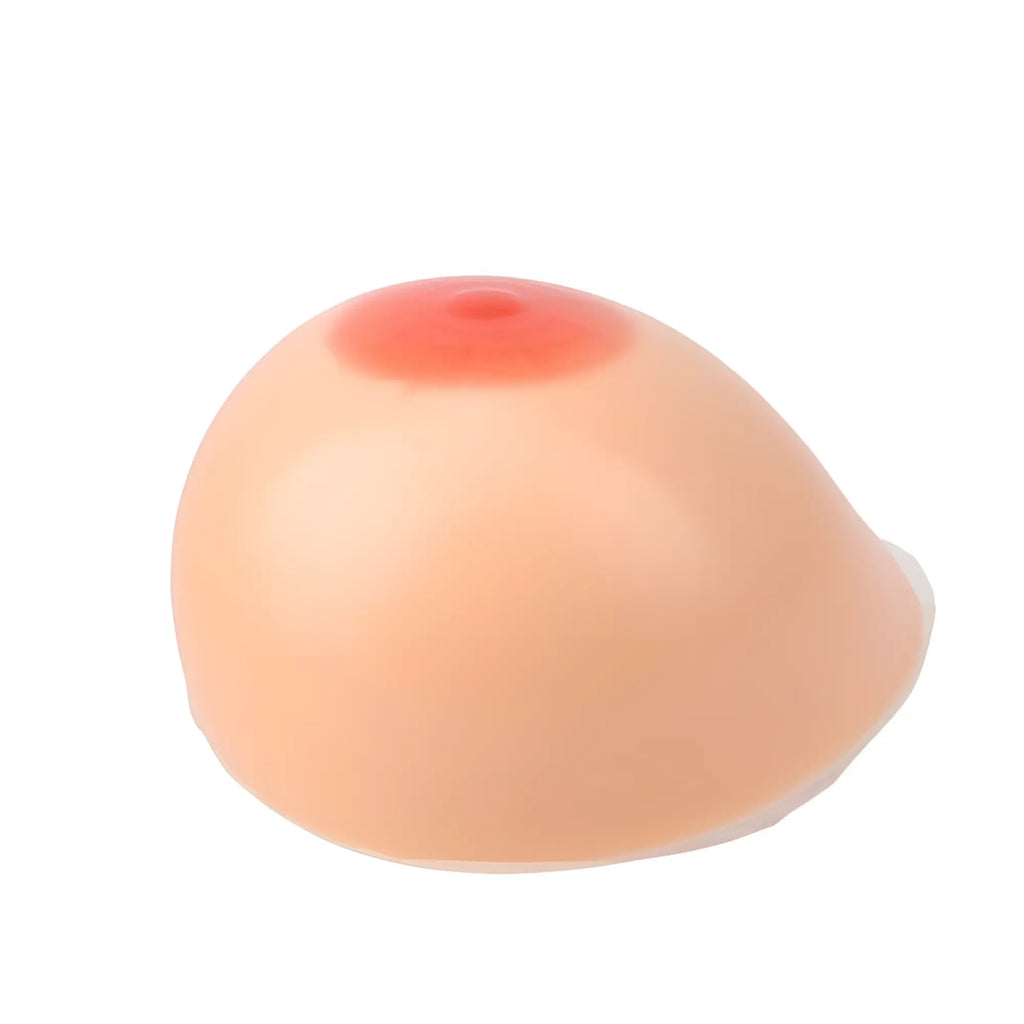 A realistic Daytona silicone breast self adhesive implant 800g g plus cup with peach surface and reddish pink areola
