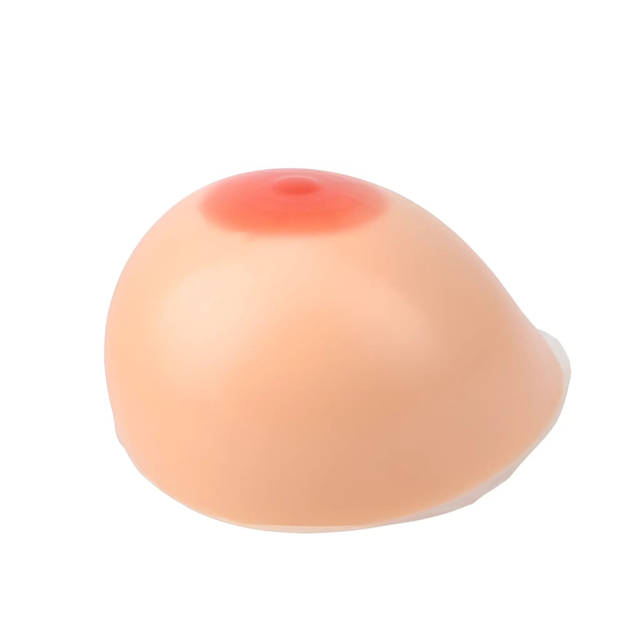 A realistic Daytona silicone breast self adhesive implant 800g g plus cup with peach surface and reddish pink areola