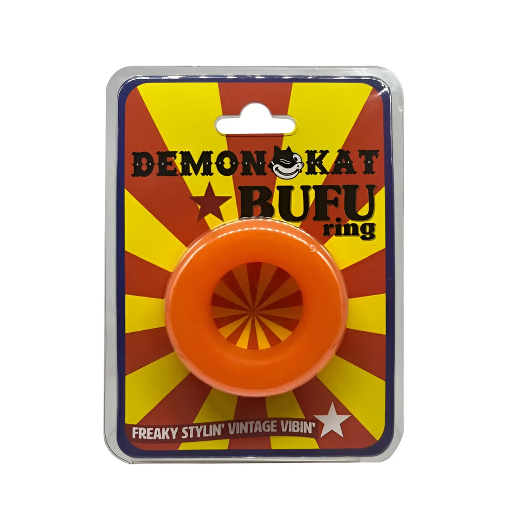 Demon kat bufu ring orange with radial pattern inside, packaged in vibrant yellow and red sunburst design
