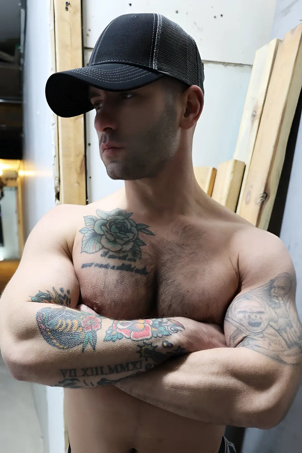 Black and gray mesh dirty trucker hat with structured front panel designed for casual outdoor wear