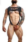 Black lace harness with metal clasps and rings by dngeon in camo design for edgy croptop styling