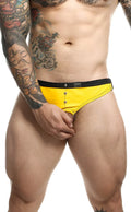 Bright yellow swim trunks with black waistband and silver button closures for dngeon c-ring jockstrap use