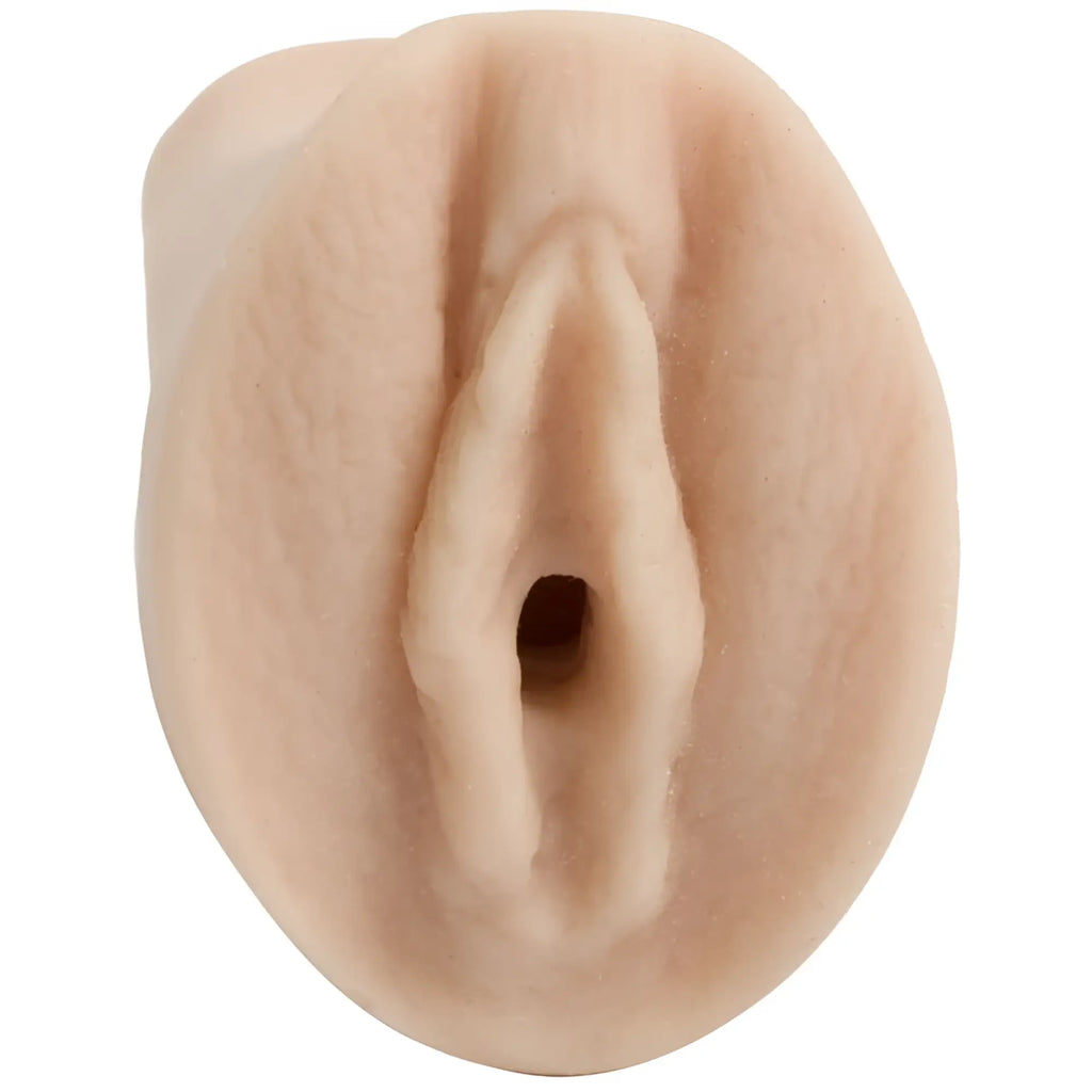 Beige silicone anal plug with realistic texture and naturalistic contours from doc johnson palm pal ultraskyn pussy white