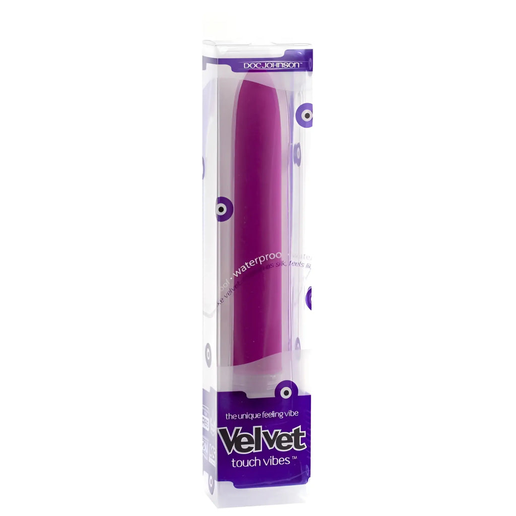 Purple velvet-textured silicone vibrator in doc johnson packaging for personal pleasure use in magenta color