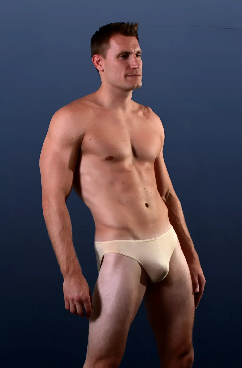 Beige tan hang-loose bikini briefs by doreanse 1281-tan worn by a man showcasing comfort and fit