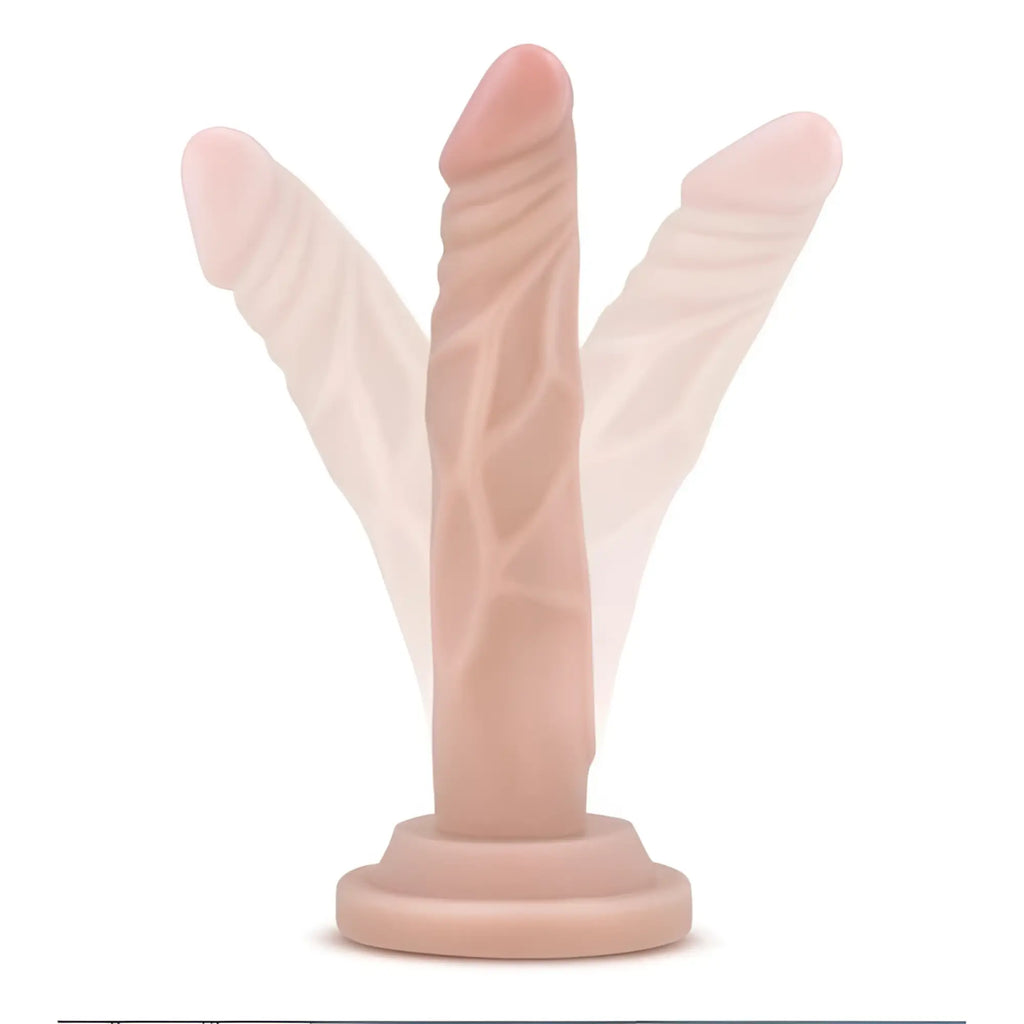 Pink silicone dr skin 5in mini cock toy with textured surface and three pronged design for intimate use