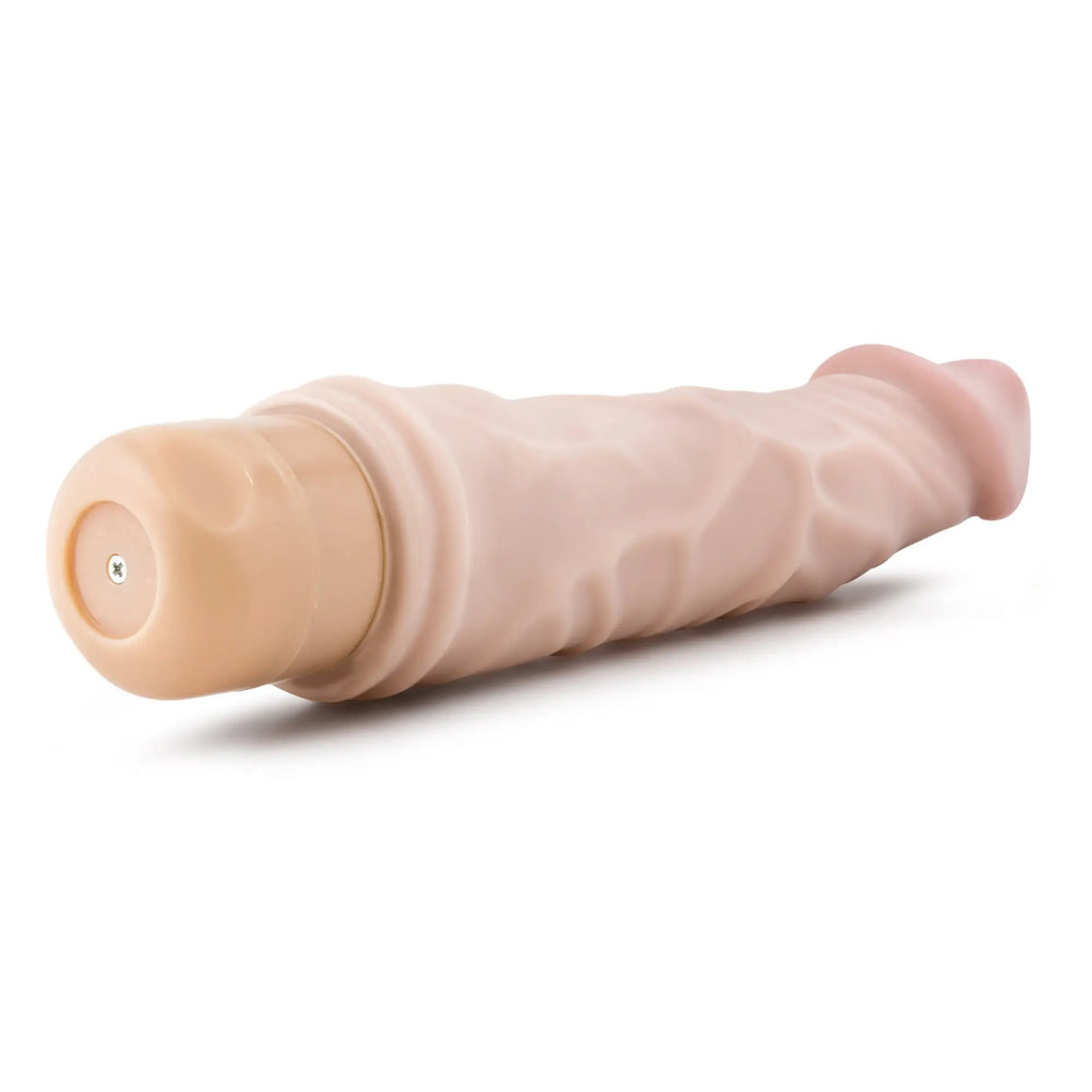 Beige silicone vibrating cock vibe with textured surface and rounded ends by dr skin for intimate use