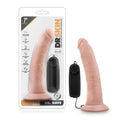 Pink silicone vibrating cock with suction cup base and black remote control from dr skin dr dave vanilla collection