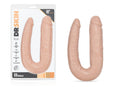 Beige silicone dual-ended dildo with realistic texture and Dr Skin branding on packaging for double vanilla use
