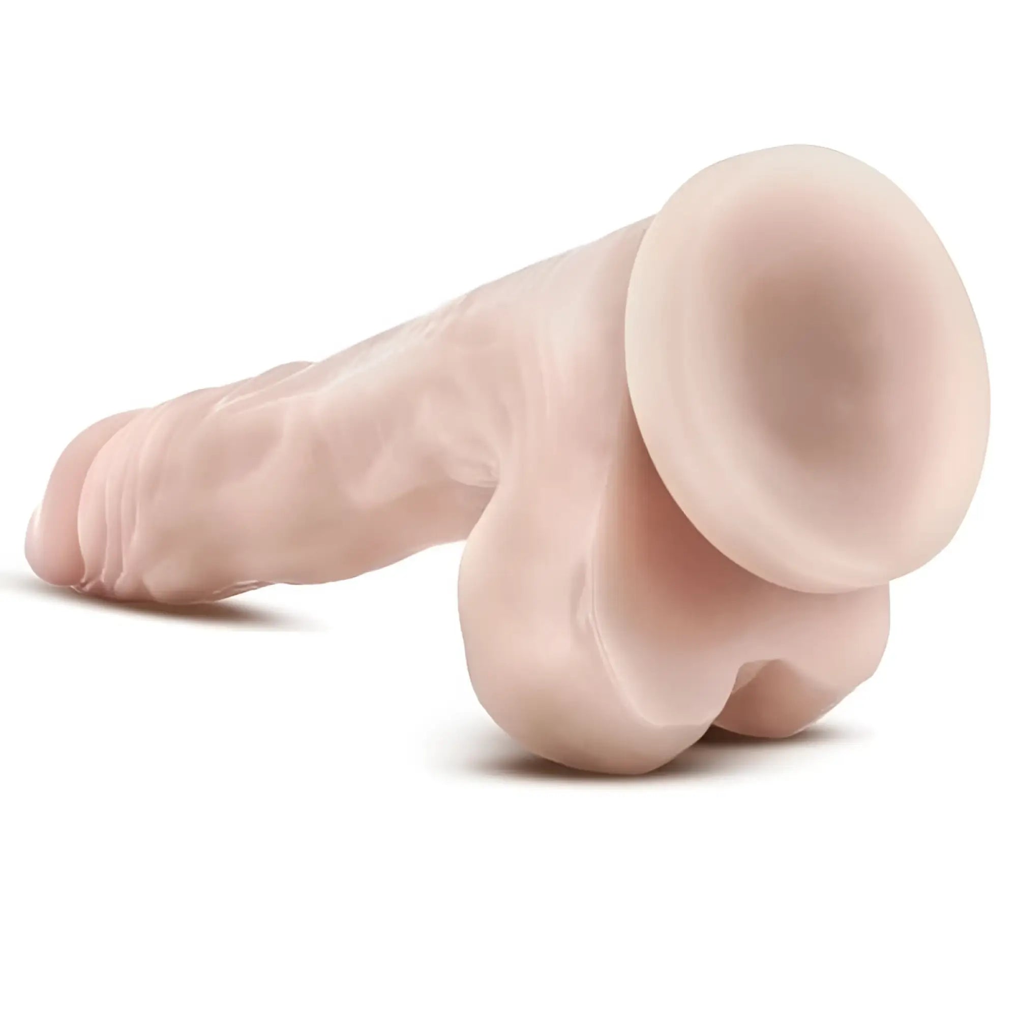 Pink silicone realistic male genital model with textured surface and rounded head from Dr Skin cock stud muffin beige