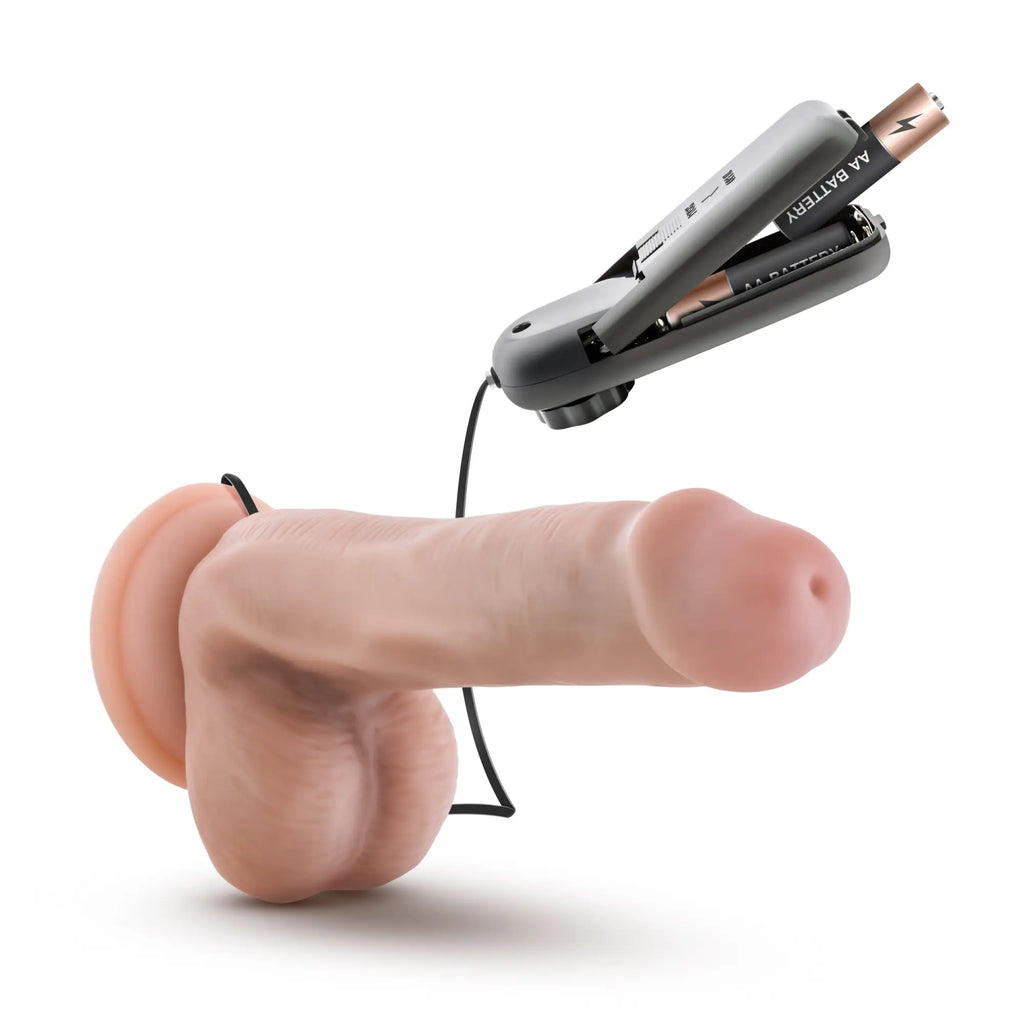 Pink silicone dr skin dr rob 6in vibrating cock with suction cup and gray battery pack attached by black cord