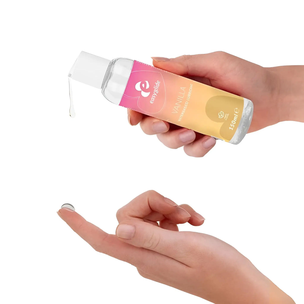A clear plastic bottle of easyglide water based lubricant with a pink and yellow vanilla flavor label 150ml