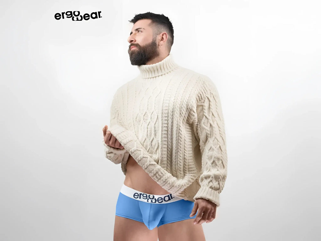 Cream-colored cable-knit turtleneck sweater from ergowear made of soft cotton for warmth and comfort