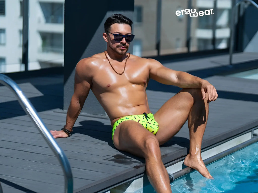 Vibrant neon green ergoWear ew1765 x4d sw swim briefs with black splatter patterns in bright yellow color