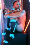 Eternity socks black and neon blue knee-high athletic socks with bold stripes and skechers logo on the side