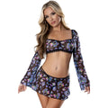 Black sheer two-piece lingerie set with iridescent mushroom pattern and lace trim including crop top skirt and g-string in lxl