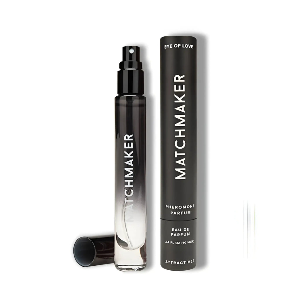Black glass spray bottle with silver gradient and black cap labeled matchmaker next to cylindrical packaging eye of love pheromone body spray black diamond 10ml