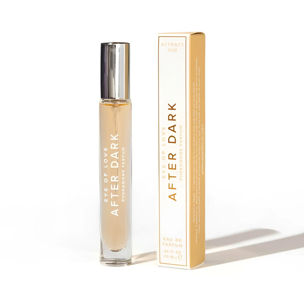 A sleek transparent glass rollerball bottle with silver cap and gold liquid labeled eye of love pheromone body spray after dark