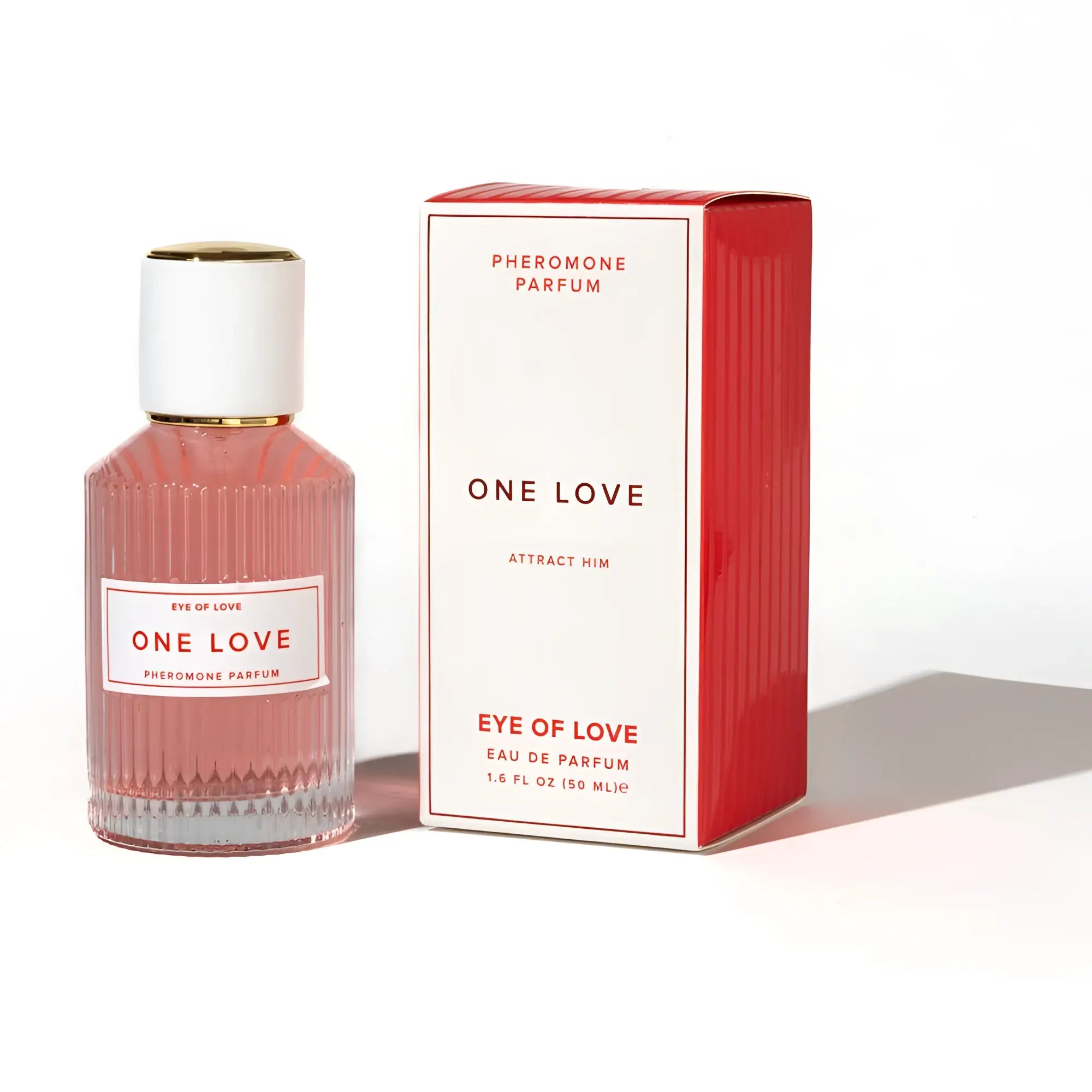 A pink ribbed glass perfume bottle with a white cap and gold accents for eye of love pheromone body spray 50ml