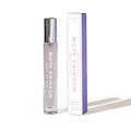 A sleek transparent glass rollerball perfume bottle with silver cap labeled eye of love morning glow body spray 10ml