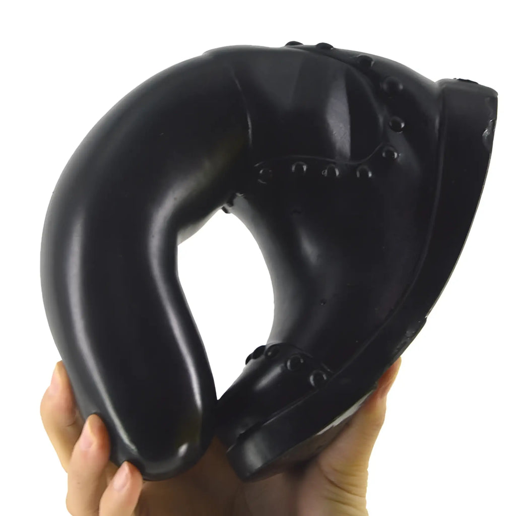 Black rubber boot-shaped neck pillow with stitched detailing designed for comfort and support by FAAK Boot Dildo Black