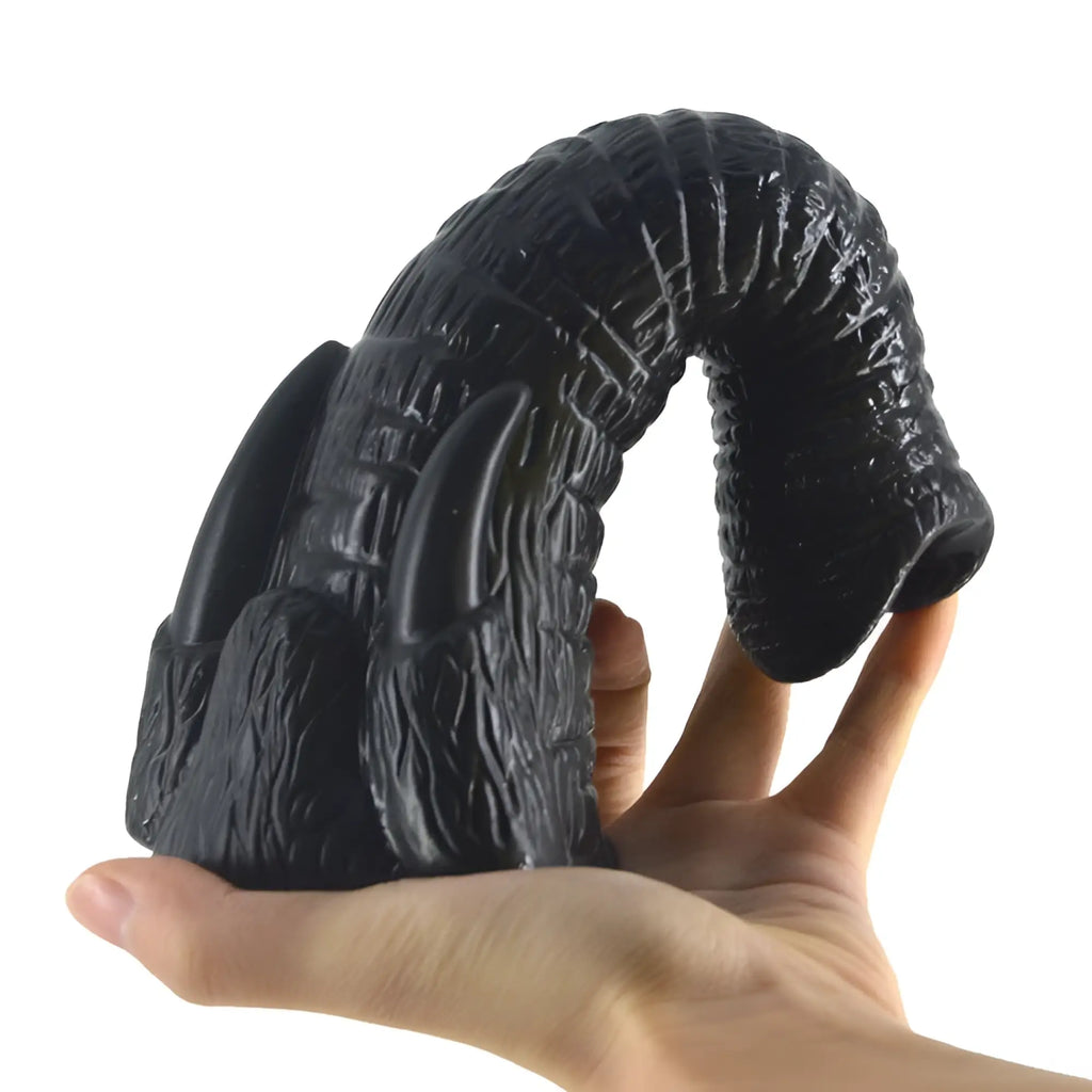 Black textured silicone FAAK Elephant dildo with realistic ridged surface and pointed tips for enhanced sensation
