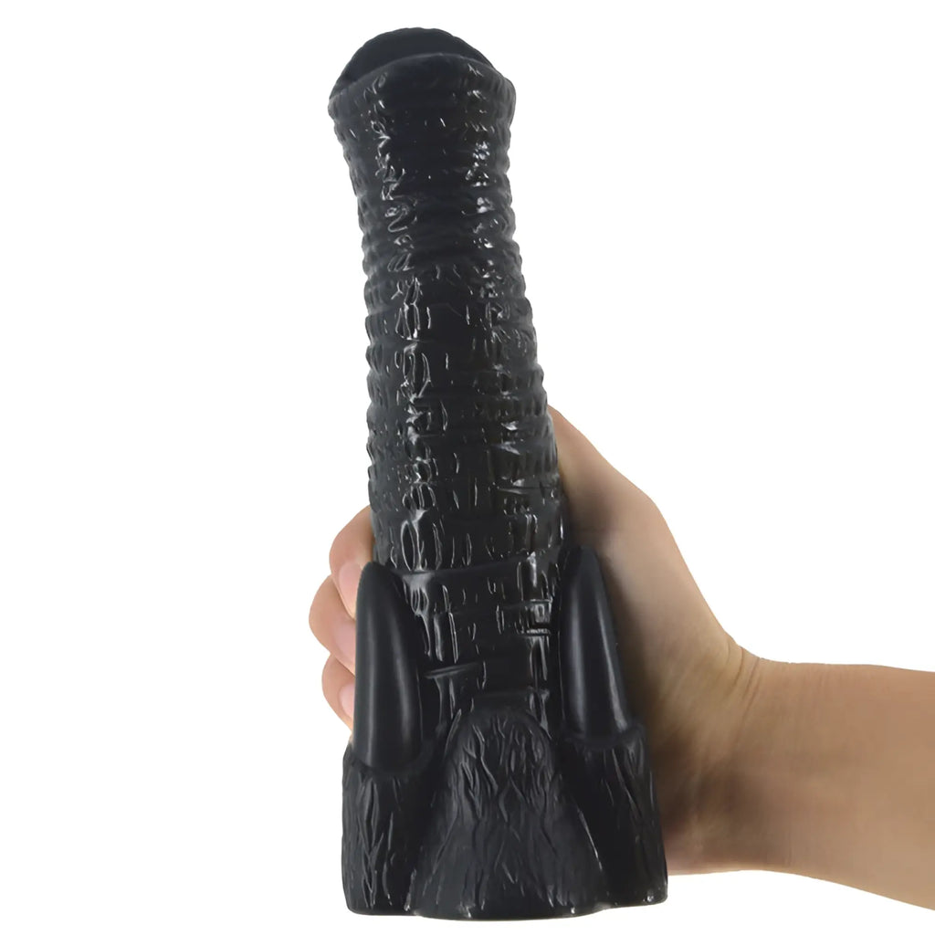 Black textured silicone dildo with ridged shaft and flared base in FAAK elephant dildo black design