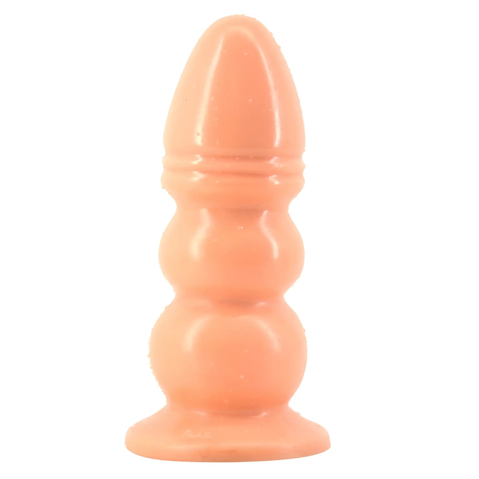 Peach-colored silicone anal plug faak huge anal plug flesh with rounded segmented design and flared base