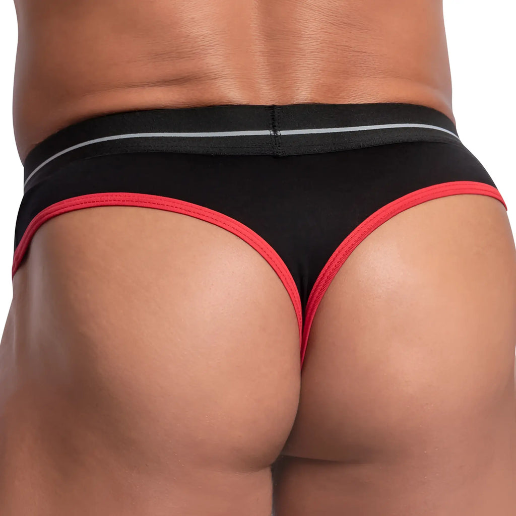 Feel fek029 thong black fabric with red trim and thin white stripe along the waistband shown from the back side