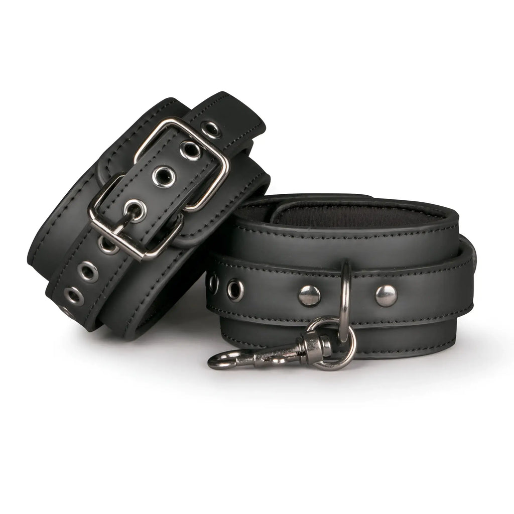 Black leather fetish collection ankle cuffs with silver metal buckles and studs for secure fit and style