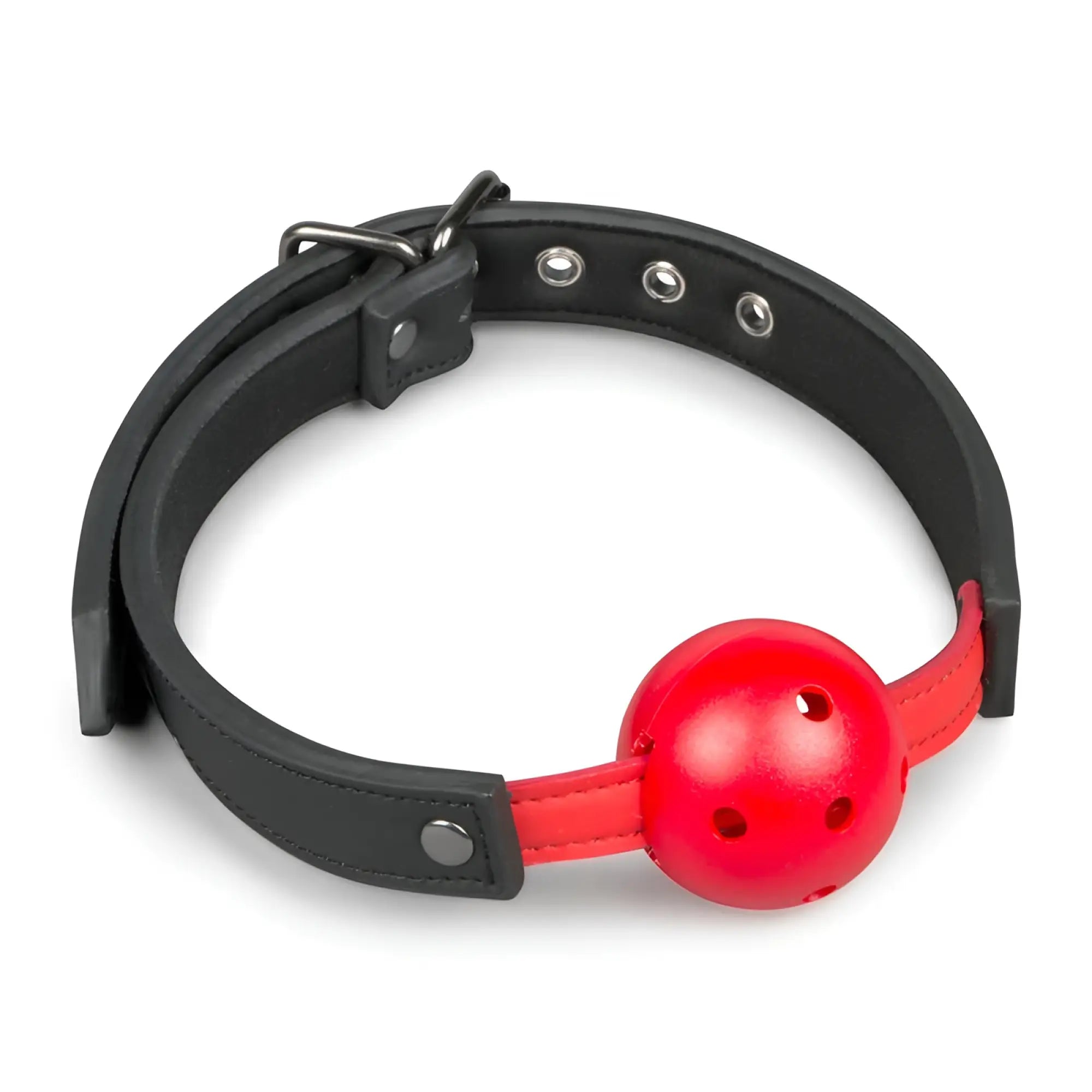 Red plastic ball gag with black leather strap and metal buckle from fetish collection with pvc ball red