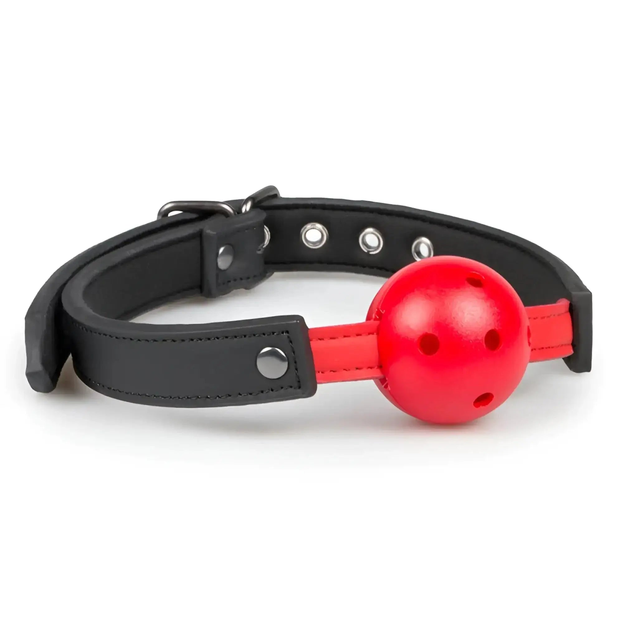 Red plastic ball gag with black leather strap and metal hardware from fetish collection for pvc ball red use