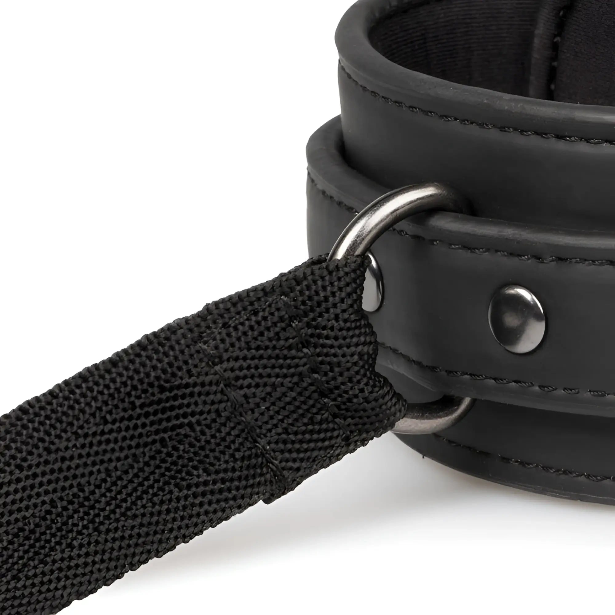 Black leather collar with metal ring and adjustable webbing strap from fetish collection beginners bondage fantasy kit