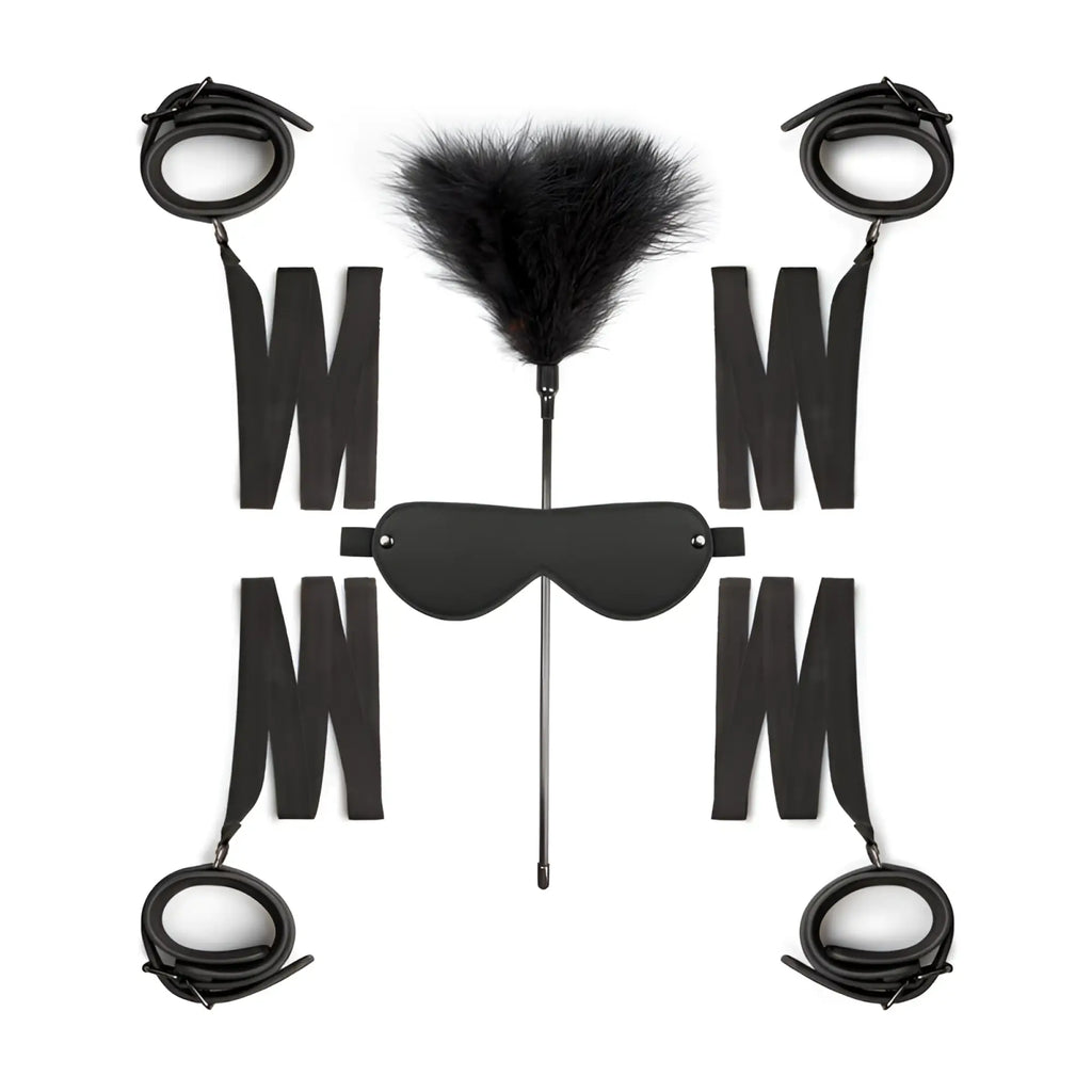 Black leather bondage kit featuring feather duster and blindfold from the fetish collection beginners bondage fantasy kit