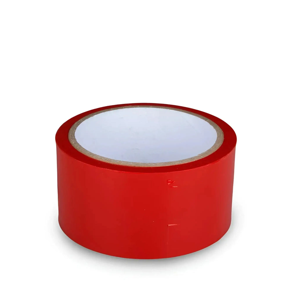 A roll of bright red fetish collection bondage tape with a white inner core and brown cardboard backing