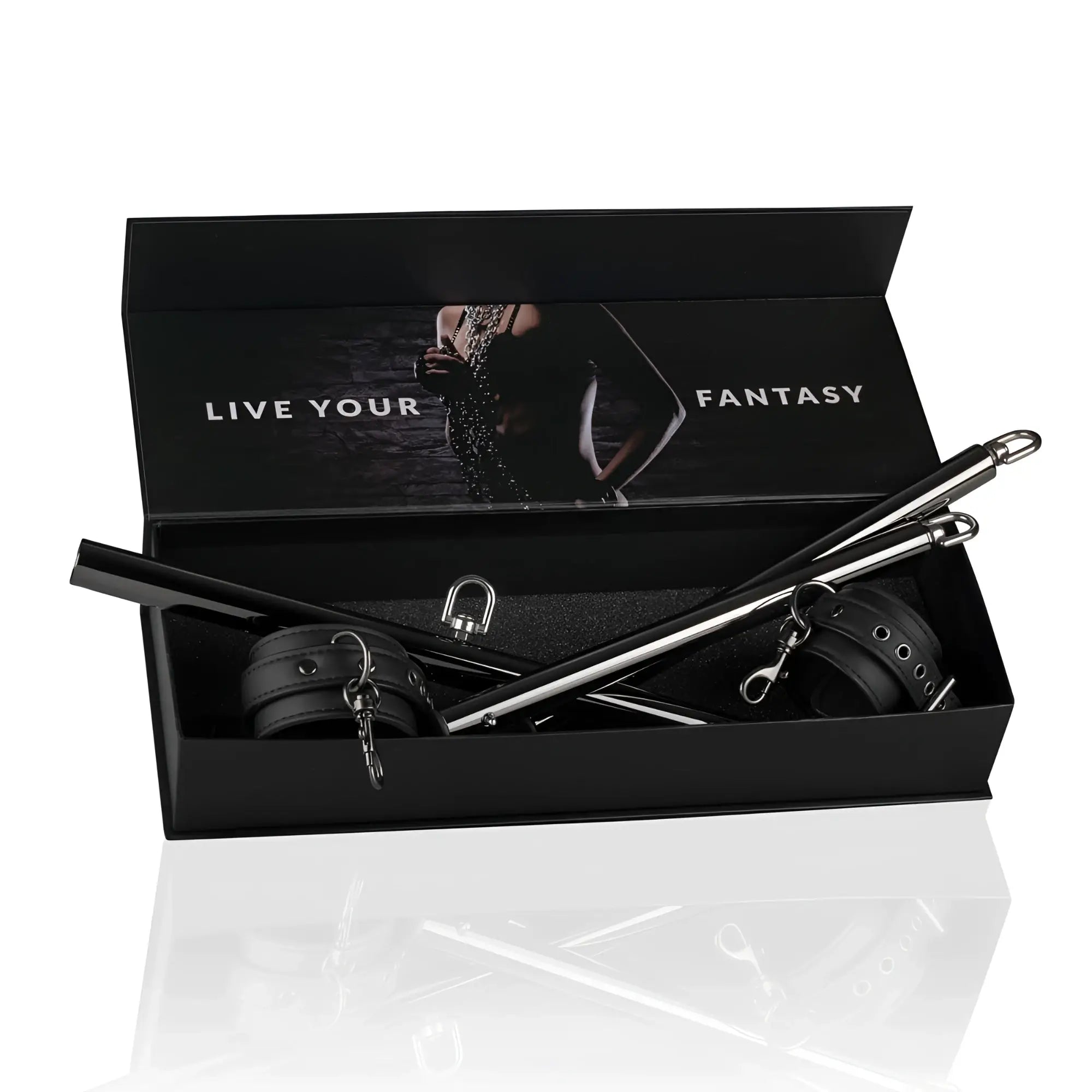 Black leather and metal bondage expander spreader bar and cuffs set in sleek black box from fetish collection