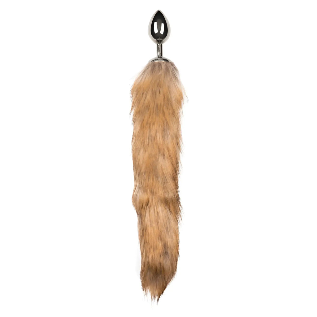 A sleek silver metallic anal plug with a tapered tip and a long tan faux fur fox tail from Fetish Collection