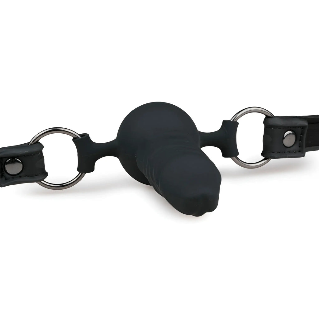 Black silicone gag with metal rings and leather straps from fetish collection featuring a silicone dong
