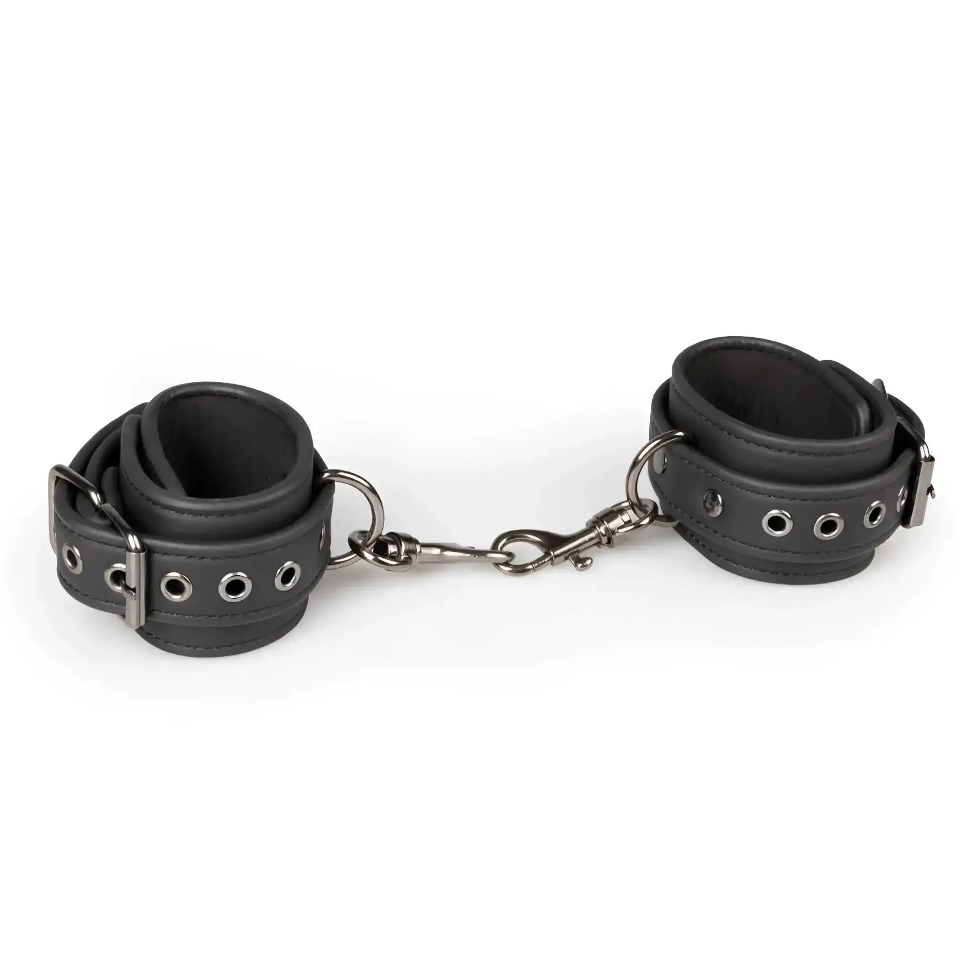 Black leather wrist cuffs connected by a metal chain from the Fetish Collection handcuffs black product line