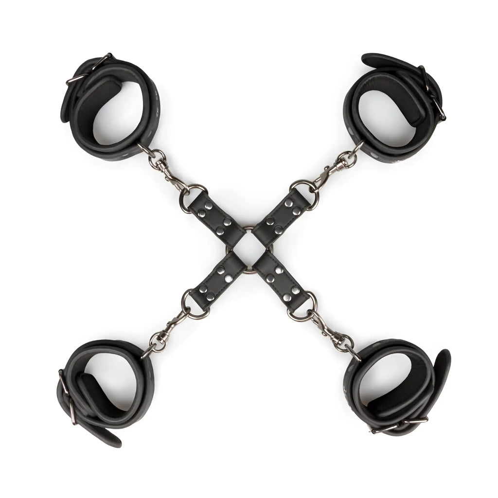 Black leather handcuffs with silver metal chains arranged in a cross for fetish collection hogtie use