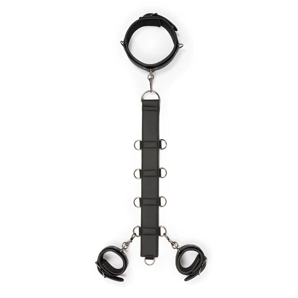 Black leather bondage restraint set with adjustable cuffs and metal rings from fetish collection for neck and wrist use