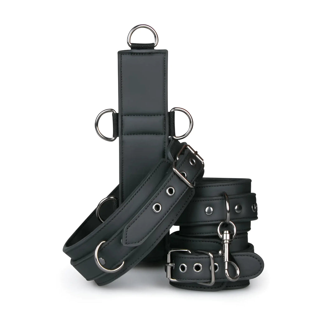 Black leather fetish collection neck and wrist restraint set with silver metal hardware and adjustable buckles