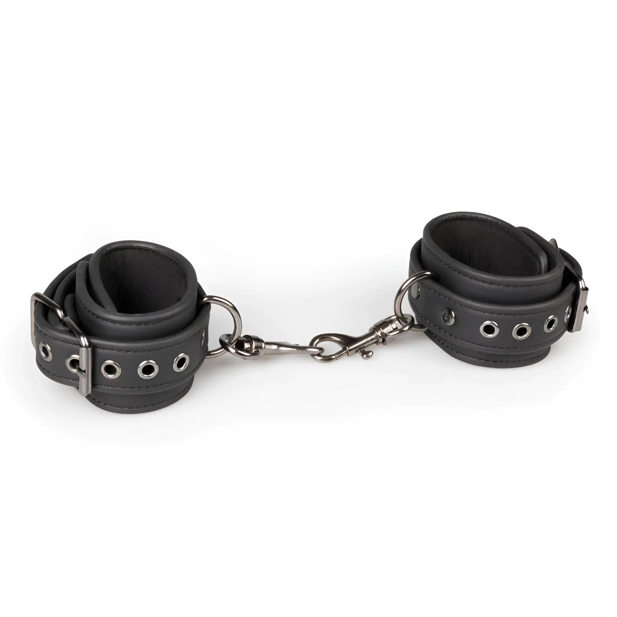 Black leather wrist cuffs connected by silver chain and clasp from fetish collection neck and wrist restraint set