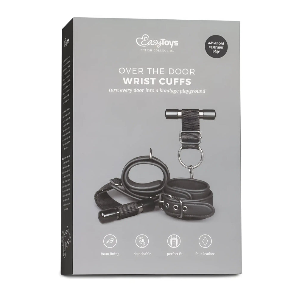 Black faux leather wrist cuffs with metal t-bar and adjustable straps for over the door bondage play from fetish collection