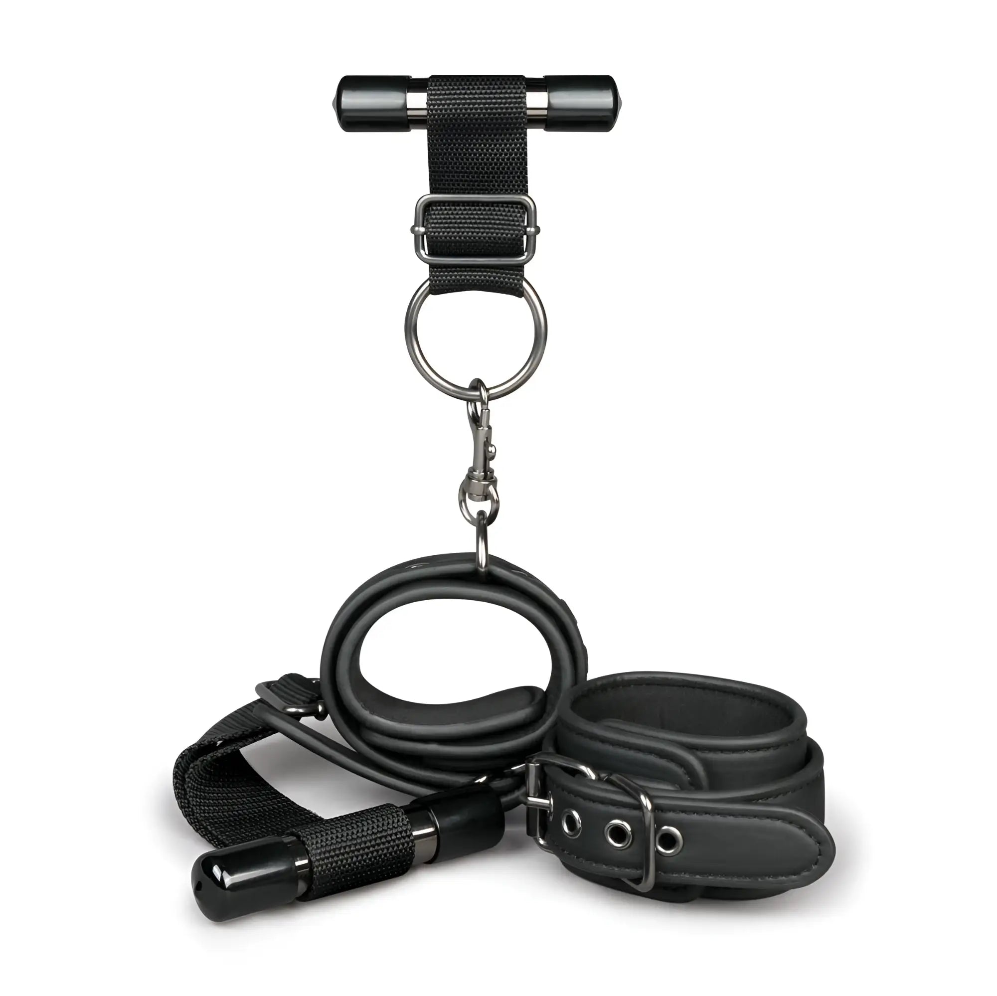 Black leather bondage set with metal hardware and t-bar harness from fetish collection over the door wrist cuffs