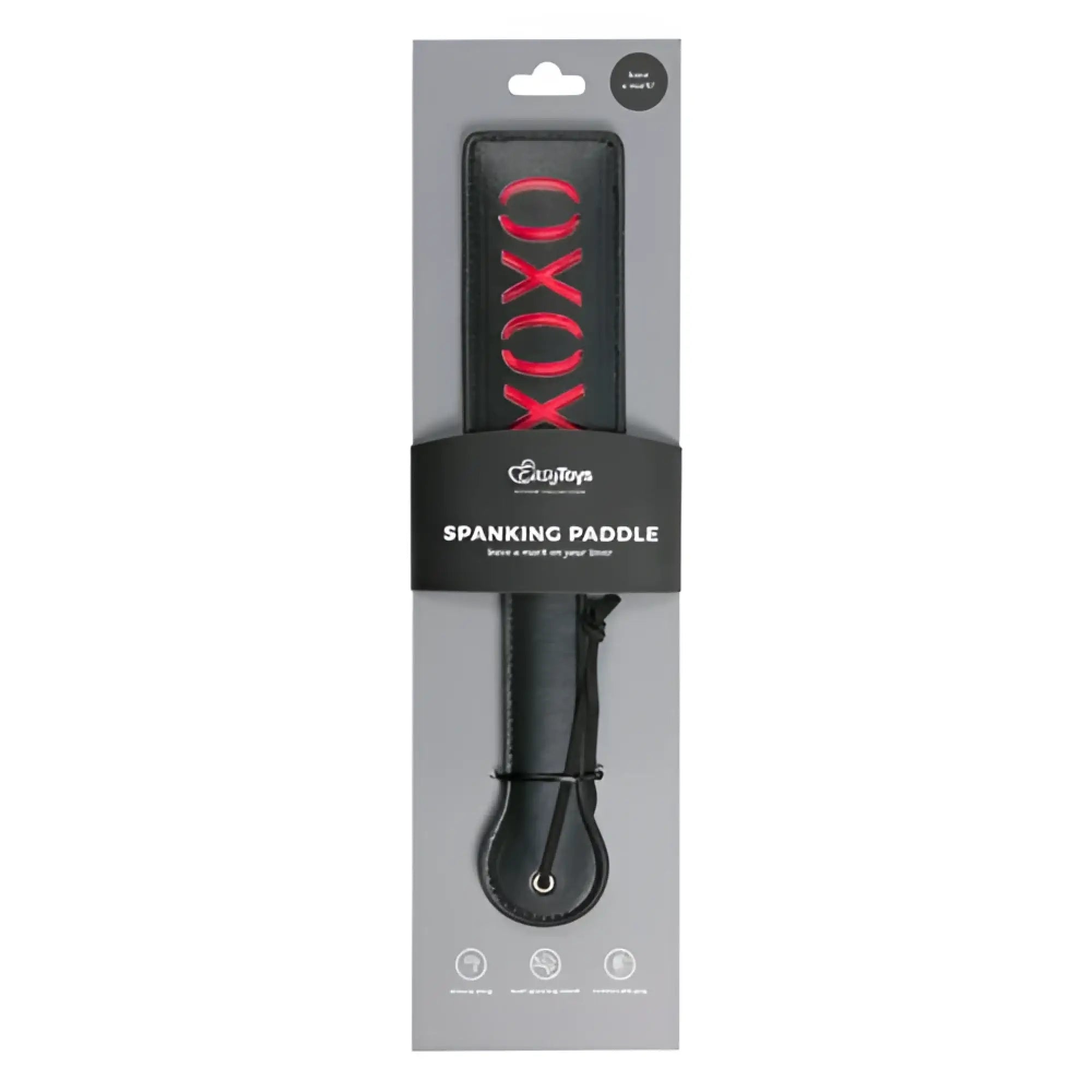 Black leather fetish collection paddle with red xoxo lettering on the handle for spanking