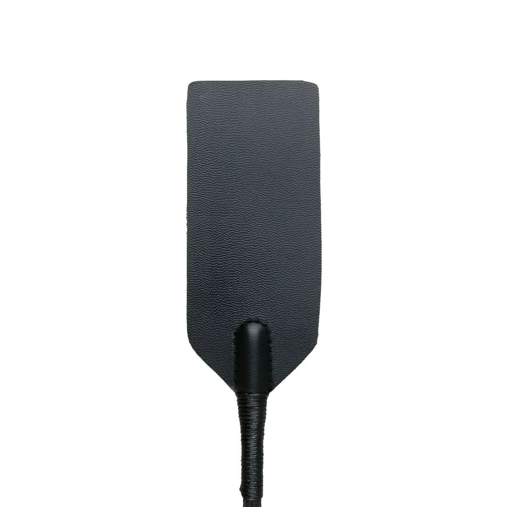Black leather rectangle crop whip with textured surface and braided handle from the fetish collection